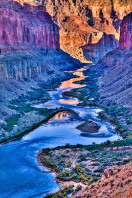 Iconic sunset view of the Colorado River, near Nankoweap Canyon, in Grand Canyon National Park. High dynamic range (HDR) image.