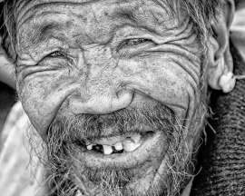 Smiling Tibetan man